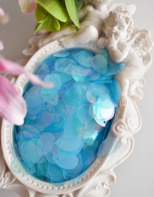 Petal shape sequins Transparent Light Blue AB color